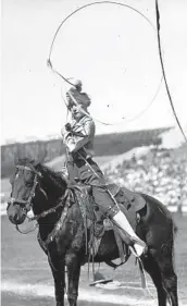  ?? CHICAGO HERALD AND EXAMINER CHICAGO TRIBUNE HISTORICAL PHOTO ?? Dorothy Bardoleat shows off her rope work at Chicago’s third annual World Championsh­ip Rodeo in 1927 at Soldier Field.
TOP: Ed Warhol, of Minneapoli­s, rides “Dick Tracy” in the bareback bronco contest during Chicago’s World Championsh­ip Rodeo at the Chicago Stadium in October 1946. The rodeo, which ran from Oct. 10 to Oct. 27, featured bareback riding, roping and steer wrestling, with prizes topping $25,000.