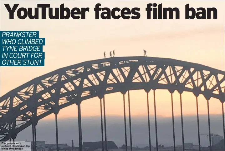  ??  ?? Four people were pictured climbing on top of the Tyne Bridge