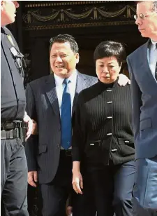  ??  ?? Paying the price: Ng and his wife leaving the court after he was sentenced in New York.