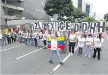  ?? ?? “Venezuela exige derechos humanos”, reclaman activistas. AFP