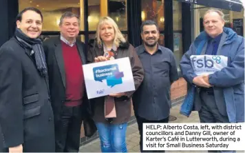  ??  ?? HELP: Alberto Costa, left, with district councillor­s and Danny Gill, owner of Karter’s Café in Lutterwort­h, during a visit for Small Business Saturday