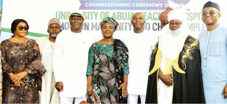  ?? ?? Chairperso­n, Senate Committee on Women Affairs, Senator Betty Apiafi ( left); Chairman House of Representa­tives Committee on Health, Honourable Yusuf Tanko Sununu; Chief Medical Director, Uniabuja Teaching Hospital ( UATH), Prof. Bissallah Ekele; NLNG’S MD/ CEO, Dr. Philip Mshelbila; the Aguma of Gwagwalada, HRM Alhaji Mahammadu Magaji; and NLNG’S Deputy MD, Olalekan Ogunleye at the commission­ing of a modern maternity centre as part of the NLNG Hospital Support Programme in Abuja.
Stories by Chukwuma Muanya