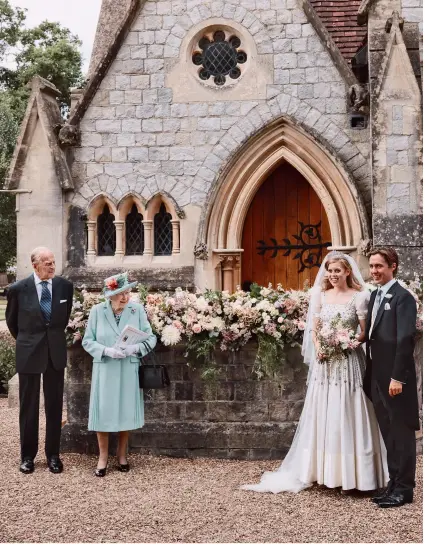  ?? ?? The couple pose with the Queen and Duke of Edinburgh at their wedding last year (above). Sister Princess Eugenie and her husband Jack Brooksbank beam as she holds their son August (left). Beatrice’s baby bump shows on a day out (below)
and at Wimbledon with Edoardo and the Countess of Wessex (below right)