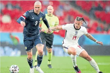 ?? ?? CHEERS: Scotland’s game against England at Wembley helped to boost beer sales.