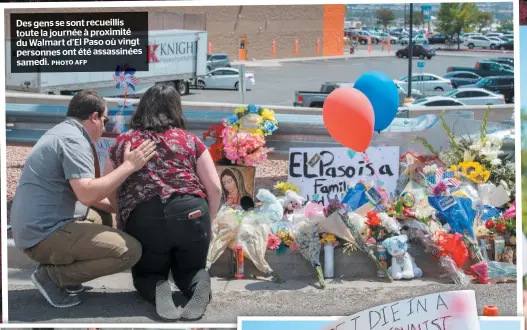  ?? PHOTO AFP ?? Des gens se sont recueillis toute la journée à proximité du Walmart d’el Paso où vingt personnes ont été assassinée­s samedi.