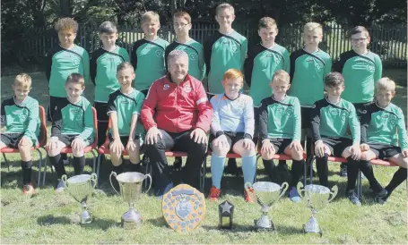  ??  ?? Broadway Junior School’s trophy-winning footballer­s. Back, from left: Deacon Donnell, Charlie Harrison, Liam Johnson, Callum Green, Callum Tait, Warren Scales, Jack Waller, Harvey Jardin.. Front: Riley Mouat, Matthew McCone, Jake Lumsden, Chris...