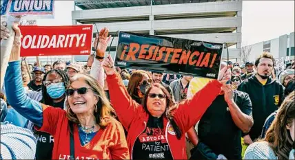  ?? Desean Mclinton-holland / New York Times ?? Amazon employees and their supporters cheer during an April unionizati­on rally on Staten Island. Concerns among workers at Amazon’s facilities on Staten Island include pay and high turnover.