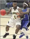  ?? Jeremy Stewart / RN-T ?? Pepperell’s Tae Hammond (left) tries to move inside against Model’s Jabrious Smith during a Region 7-AA game Tuesday at Pepperell.