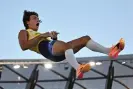  ?? Ben Stansall/AFP/Getty ?? Sweden’s Mondo Duplantis reacts as he sets another world record in the men’s pole vault. Photograph:
Images
