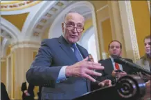  ?? AP photo ?? Senate Majority Leader Chuck Schumer, D-N.Y., meets with reporters to discuss efforts to pass the final set of spending bills to avoid a partial government shutdown, at the Capitol in Washington on Wednesday.