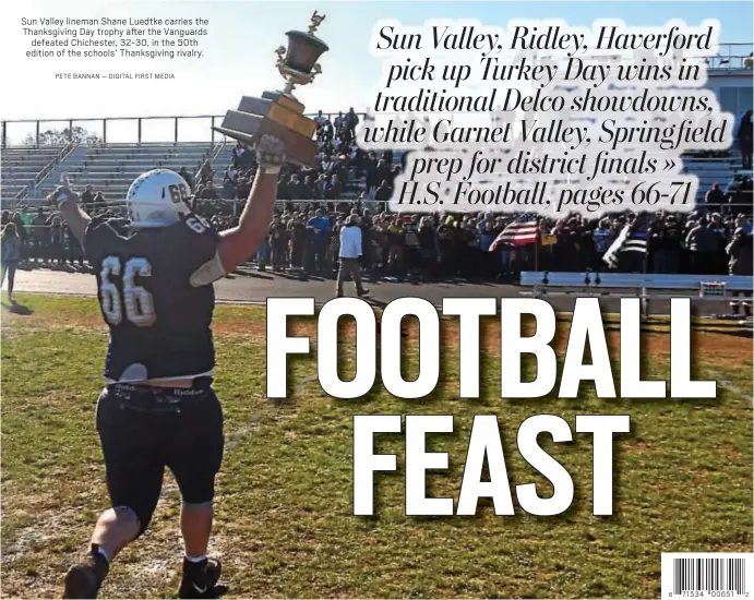  ?? PETE BANNAN — DIGITAL FIRST MEDIA ?? Sun Valley lineman Shane Luedtke carries the Thanksgivi­ng Day trophy after the Vanguards defeated Chichester, 32-30, in the 50th edition of the schools’ Thanksgivi­ng rivalry.