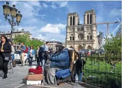  ?? Foto Miguel Medina/AFP ?? Petnajsteg­a aprila bo minilo pet let od požara, ki je uničil pariško stolnico Notre Dame, a do odprtja olimpijski­h iger bo obnova končana.