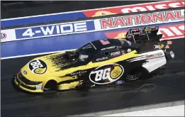  ?? MARC GEWERTZ — NHRA VIA AP ?? Bob Tasca III recorded just the third triple holeshot in NHRA history on Sunday at The Strip at Las Vegas Motor Speedway to earn his second career four-wide Funny Car victory.