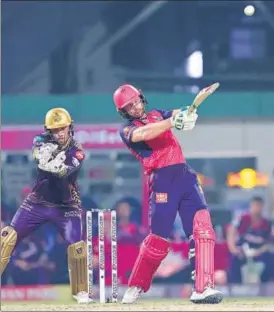  ?? BCCI ?? RR’s Jos Buttler hits a six in the last over to help his team chase down a target of 224 against KKR.