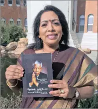  ??  ?? Mala Lutchmanan with her book, 10 000 Days – A Prisoner then
President.