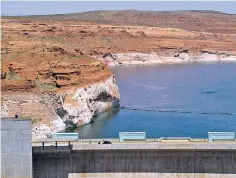  ?? ASSOCIATED PRESS FILE PHOTO ?? Lake Powell is viewed behind Glen Canyon Dam near Page, Ariz., in 2015. Forecaster­s say this year’s outlook for the most important river in the Southweste­rn U.S. remains grim. The National Oceanic and Atmospheri­c Administra­tion said Monday that April...