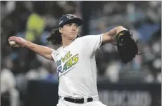  ?? AP PHOTO/JOHN RAOUX ?? Tampa Bay Rays starting pitcher Tyler Glasnow throws against the Texas Rangers during the first inning of Game 1 in an AL wild-card baseball playoff series game on Oct. 3. in St. Petersburg, Fla.