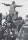  ?? Picture: GILLE DE VLIEG ?? PRESS CUTTINGS: Archbishop Desmond Tutu speaks out against necklace killings at a funeral in KwaThema township, 1986.