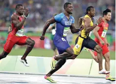  ?? AP Photo/Kirsty Wiggleswor­th ?? ■ From left, Bahrain's Kemarley Brown, United States’ Justin Gatlin, Jamaica's Yohan Blake and China's Su Bingtian compete in a 100-meter semifinal Aug. 14, 2016, during the Summer Olympics in Rio de Janeiro. With the 100 and 200 up for grabs again, Noah Lyles and Christian Coleman will be in the mix—along with defending world champion Gatlin—to be the world's next Olympic sprint champions.