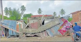  ?? REUTERS ?? A building destroyed following an earthquake in Mamuju, West Sulawesi, Indonesia.