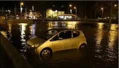  ??  ?? A lady returned from Dublin to find her car in the flood water on The Promanade on Saturday night.