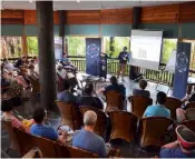  ??  ?? Above: Dr Smullen presents the results of his team’s work at the Ridley Salmon Seminar in Queensland