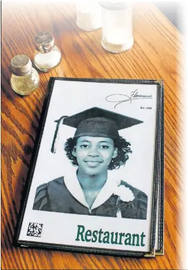  ?? ARCHIVES] ?? Florence Jones Kemp’s high school graduation photo adorns the menu at Florence’s Restaurant, which opened in Oklahoma City in 1952. [THE OKLAHOMAN