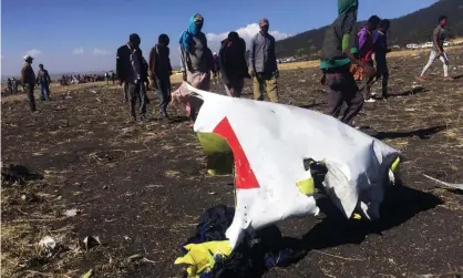  ??  ?? The scene of the crash near the town of Bishoftu, south-east of Addis Ababa. Photograph: Tiksa Negeri/Reuters