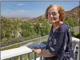  ?? Katharine Lotze/The Signal ?? Betty Peters on the balcony of her Castaic home. She can see Pitchess Detention Center from her window, which is what started her on the path to helping family members get to the jail for visiting hours on Saturdays and Sundays.