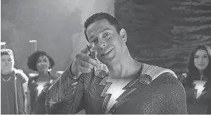  ?? WARNER BROS. PICTURES ?? Billy ( Zachary Levi, center) leads a family of superheroe­s in “Shazam! Fury of the Gods.”
