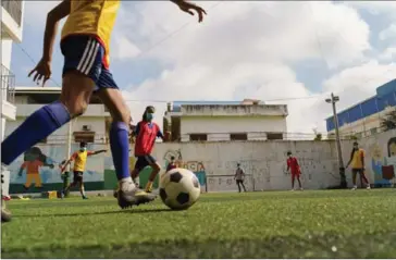  ?? SUPPLIED ?? ISF welcomed Tottenham Hotspur’s Global Football Developmen­t coaches who worked with participan­ts and volunteer coaches to support grassroots football initiative in Phnom Penh.