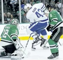  ?? LM OTERO/AP ?? Toronto centre Nazem Kadri jumps as Dallas goalie Kari Lehtonen blocks a shot in front of defenceman Julius Honka on Tuesday in Dallas. The Stars beat the Maple Leafs 6-3.