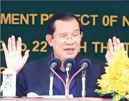  ?? MINISTRY OF INFORMATIO­N ?? Hun Sen defended his decision not to cancel flights from China.