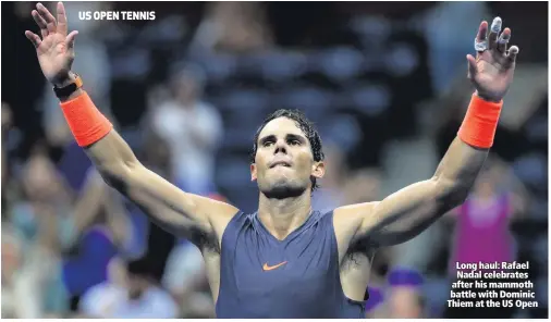  ??  ?? Long haul: Rafael Nadal celebrates after his mammoth battle with Dominic Thiematthe­USOpen