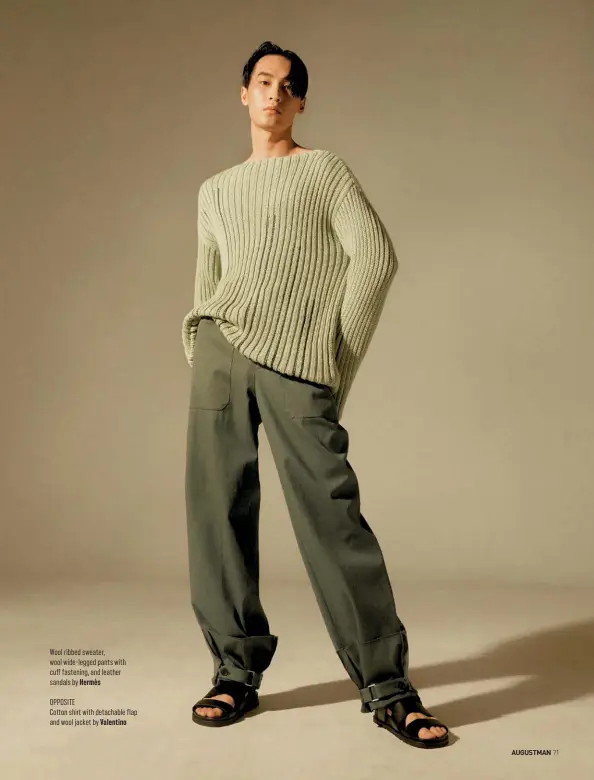  ??  ?? Wool ribbed sweater, wool wide-legged pants with cuff fastening, and leather sandals by Hermès