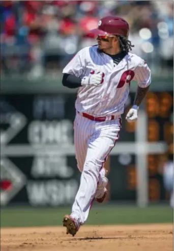  ?? LAURENCE KESTERSON — THE ASSOCIATED PRESS ?? Freddy Galvis rounds the bases after hitting the first of his two home runs Sunday, highlighti­ng a rare power display that saw the Philies go deep six times in a game for first time since August 2004. The Phils trounced the Padres, 7-1. the