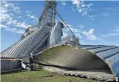  ?? RYAN LENZ/SPECIAL TO THE REGISTER ?? The August 2020 derecho destroyed these grain bins at an elevator in Luther.