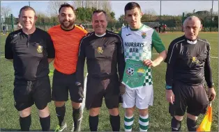  ??  ?? Macroom FC Captain Andrew Hegarty pictured with officials and Regional Utd captain prior to Munster Junior Cup game.