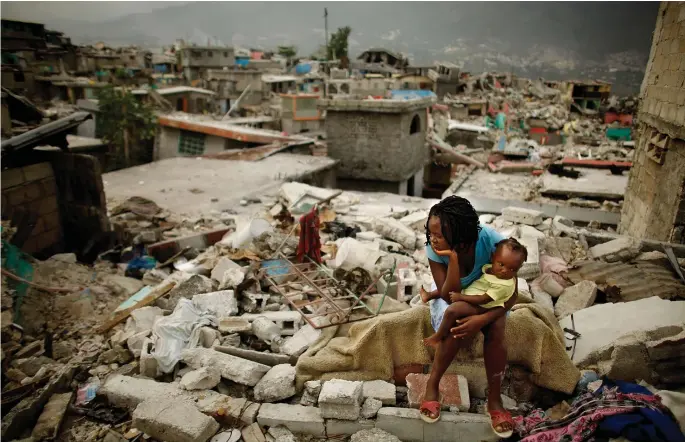  ??  ?? Above: A devastatin­g earthquake in Haiti in January 2010 killed an estimated 250,000 people and left more than a million people homeless.