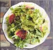  ??  ?? The Salade Verte at Le Comptoir du Vin features watermelon radish and chili bottarga.