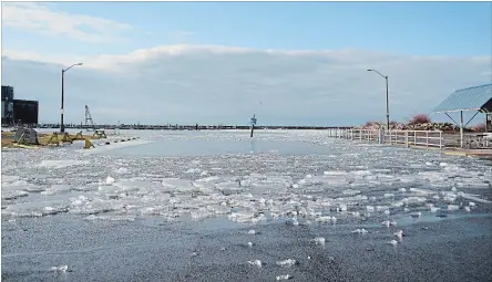  ?? DAVE JOHNSON
THE WELLAND TRIBUNE ?? Ice and water are pushed up at the boat launch at H.H. Knoll Lakeview Park in Port Colborne Wednesday. See the gallery at wellandtri­bune.ca.