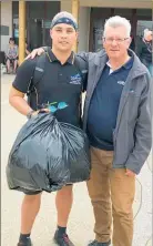  ?? PHOTOS / SUPPLIED. ?? All hands were on deck to help clean up the streets of Waihi, Waihi Beach and Paeroa. Hauraki District Mayor John Tregidga with Waihi College head boy Abraham Thompson came to support the teams on the ground during the Waihi clean-up event, the largest on record.