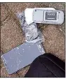  ?? AP/Dutch Defense Ministry ?? This image shows one of many phones used by four Russians after one of them tried to destroy it when they were caught April 13 in The Hague, Netherland­s.