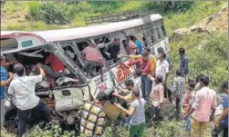  ?? PTI ?? Rescue efforts on at the site where a stateowned bus fell into a gorge, killing some 52 pilgrims, in Jagtial district in Telangana on Tuesday. The bus was returning from Kondagattu.