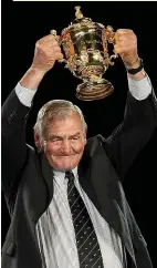  ??  ?? Top: Former All Black Brian Lochore in his playing days. Left: Sir Brian with the William Webb Ellis trophy in 2011.