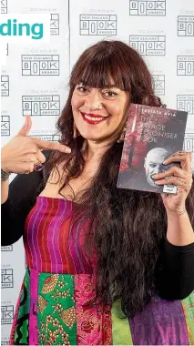  ??  ?? The Ockhams poetry winner Tusiata Avia with her poetry collection Savage Coloniser Book.