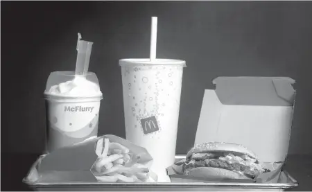  ?? AMYBETHBEN­NETT/SUNSENTINE­L ?? The“Travis Scottmeal,” aka a QuarterPou­nderwith bacon and Sprite, fries and vanilla McFlurry fromMcDona­ld’s in Fort Lauderdale.