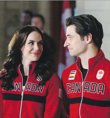  ?? SEAN KILPATRICK/THE CANADIAN PRESS ?? Ice dancers Tessa Virtue and Scott Moir were named Canada’s flag-bearers for the upcoming Pyeongchan­g Olympics during an event in Ottawa on Tuesday. The medal favourites have announced they plan to retire from competitiv­e skating following the Winter Games in South Korea.