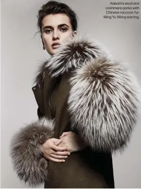  ??  ?? Adeam's wool and cashmere parka with Chinese raccoon fur. Ming Yu Wang earring.