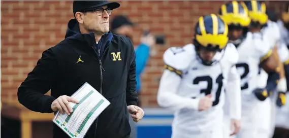  ?? THE ASSOCIATED PRESS/FILES ?? Michigan coach Jim Harbaugh is winless against Ohio State in three games since he became Wolverines coach. He hopes to change that this season.